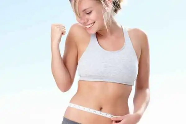 woman happy after fat reduction treatment Belsize Park