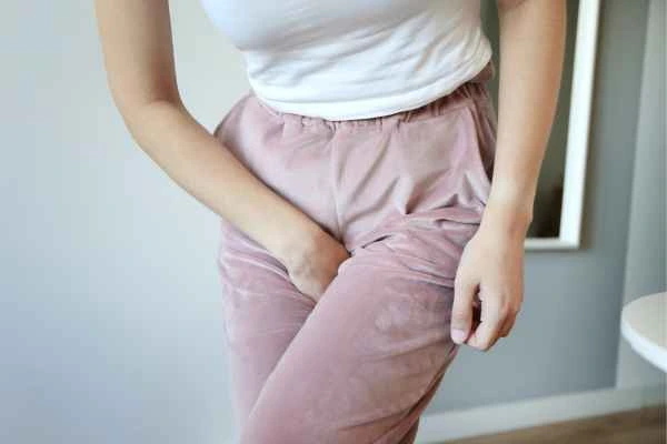 woman running for the toilet because of urinary incontinence Belsize Park
